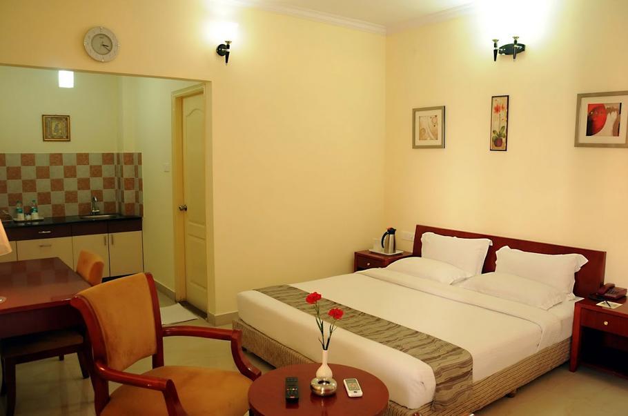 Ivory Inn Bangalore Kamer foto