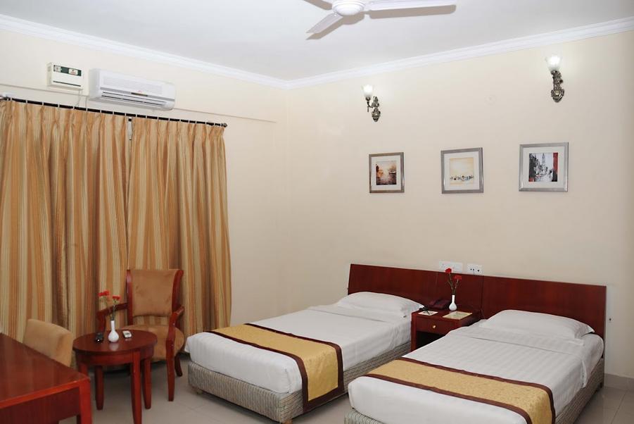Ivory Inn Bangalore Kamer foto